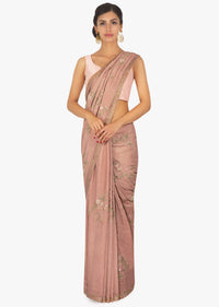 Salmon peach resham embroidered saree with fancy tassel border