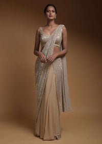 Sand Beige Ready Pleated Saree In Crepe With An Attached Pallu Embellished In Sequins And Ruffle Hem Online - Kalki Fashion