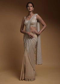 Sand Beige Ready Pleated Saree In Crepe With An Attached Pallu Embellished In Sequins And Ruffle Hem Online - Kalki Fashion