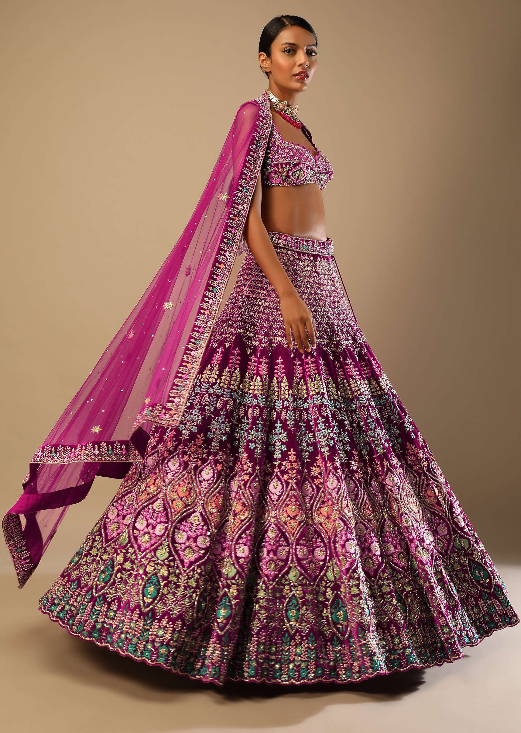 Sangria Lehenga Choli In Velvet With Colorful Resham And Sequin Flowers And Golden Cut Dana Adorned Moroccan Motifs