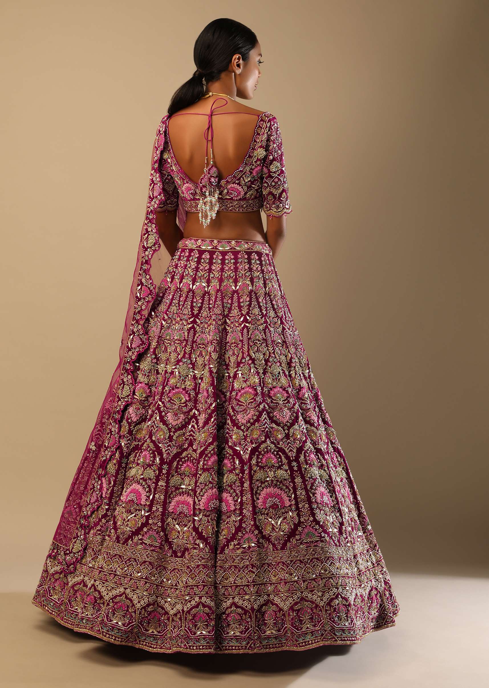 Sangria Velvet Lehenga Choli With Mughal Inspired Hand Embroidered Kalis Using Multi Colored Accents