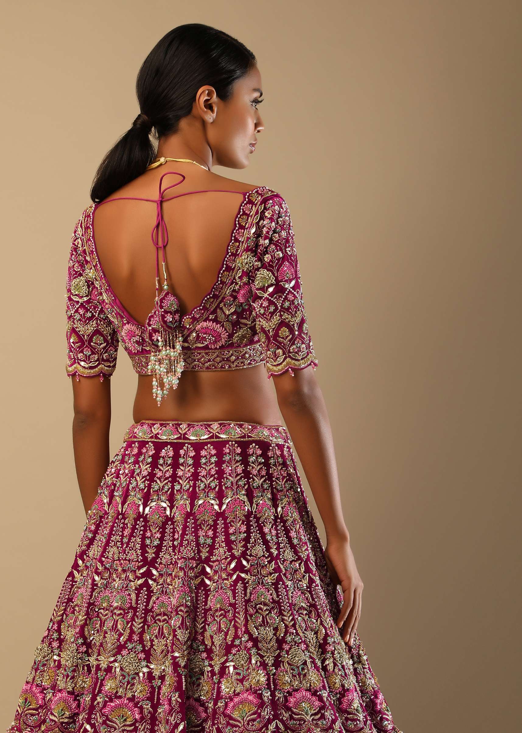 Sangria Velvet Lehenga Choli With Mughal Inspired Hand Embroidered Kalis Using Multi Colored Accents