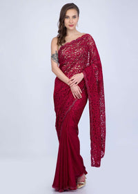 Scarlet red half an half saree featuring in chantilly lace and satin chiffon only on Kalki