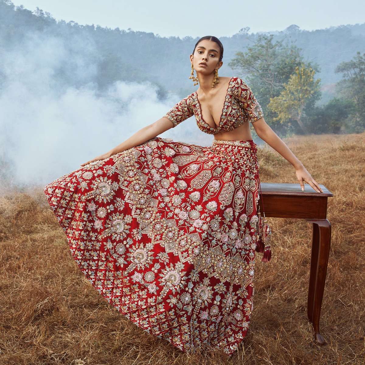 Scarlet Red Lehenga Choli In Raw Silk With 3D Flowers And Cut Dana Embroidered Summertime Flowers And Geometric Motifs