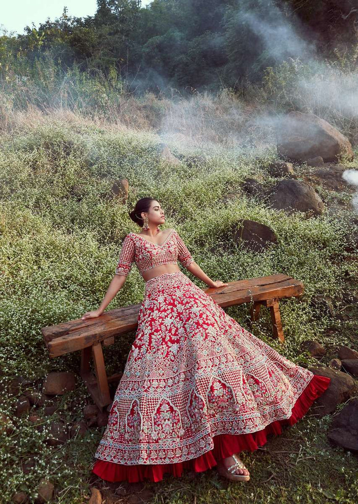 Scarlet Red Lehenga Choli In Raw Silk With Embossed Embroidery In Summertime Flowers And Mughal Motifs