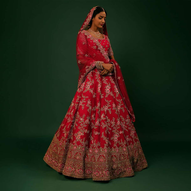 Scarlet Red Lehenga Choli In Raw Silk With Golden Zari Embroidered Heavy Mughal Border And Floral Jaal With Colorful Resham Flowers