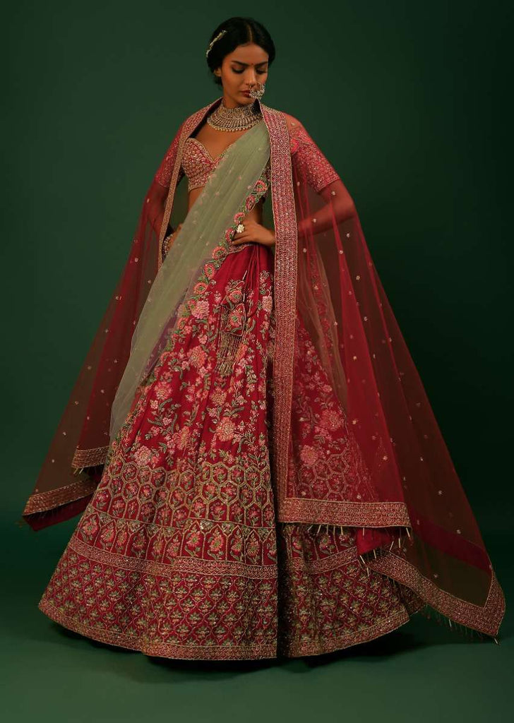 Scarlet Red Lehenga Choli With Colorful Resham And Zardosi Embroidered Flowers And Heavy Border With Honeycomb And Moroccan Motifs