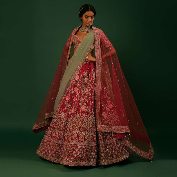 Scarlet Red Lehenga Choli With Colorful Resham And Zardosi Embroidered Flowers And Heavy Border With Honeycomb And Moroccan Motifs