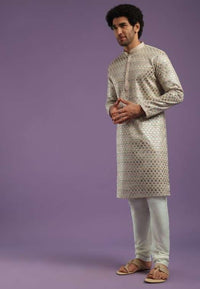 Beige Festive Textured Kurta Set With Sequins Work In Art Silk