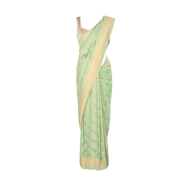 Sea foam green georgette saree in floral weaved butti and border