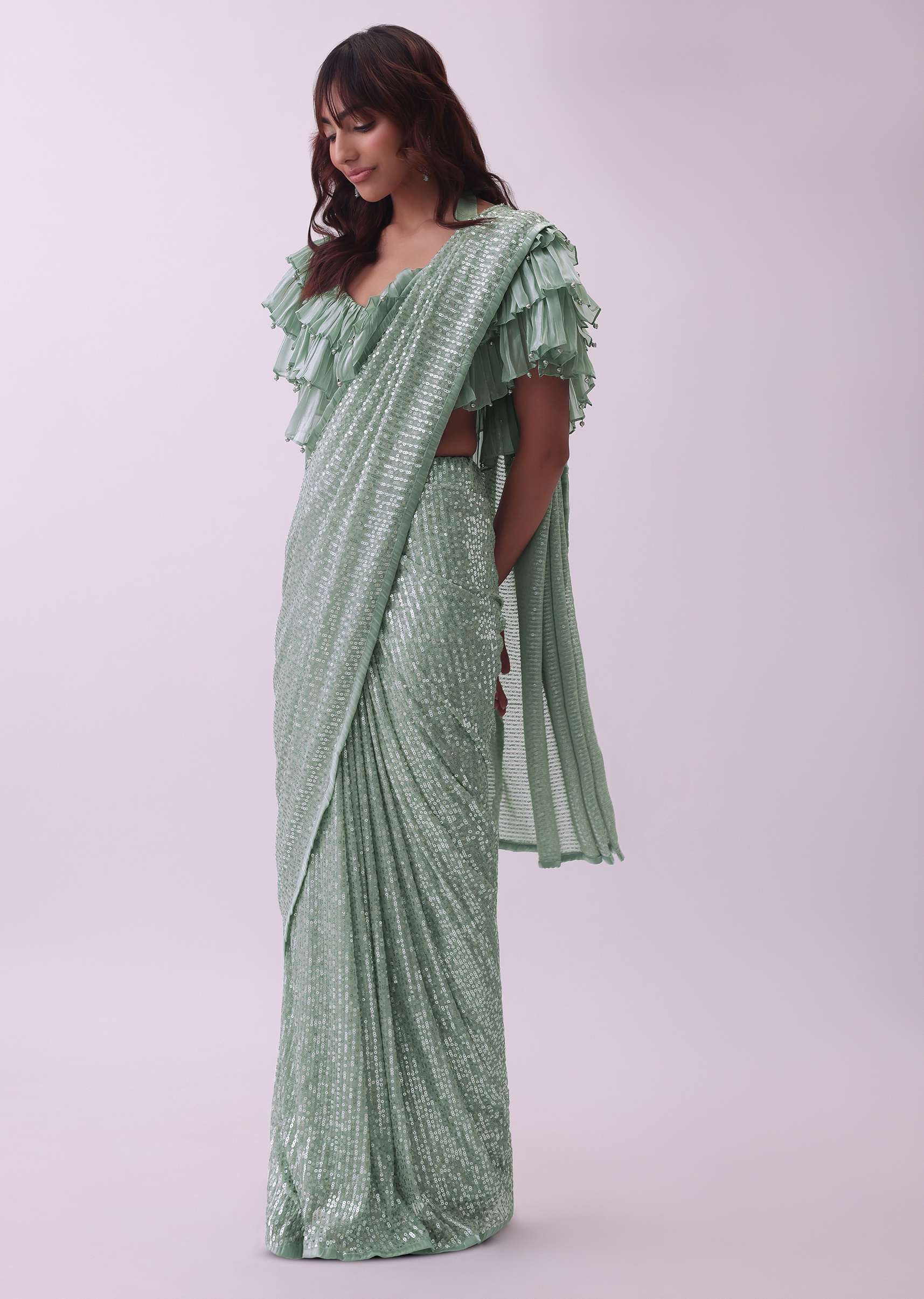 Sea Green Sequins Saree And Blouse With Organza Ruffle