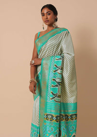 Sea Green Dola Silk Patola Printed Saree With Foil Detail Pallu And Unstitched Blouse Piece