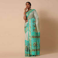 Sea Green Dola Silk Patola Printed Saree With Foil Detail Pallu And Unstitched Blouse Piece