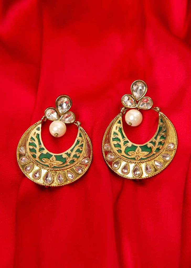 Self carved chandbali earring enhanced with kundan and  pearl