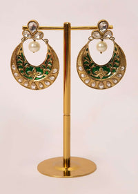Self carved chandbali earring enhanced with kundan and  pearl