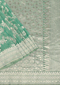 Sea Green Handloom Saree In Tissue Georgette With Zari Weave And An Unstitched Blouse