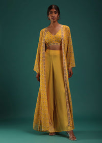 Mustard Yellow Floral Printed Crop Top And Palazzo Set With Cape In Georgette