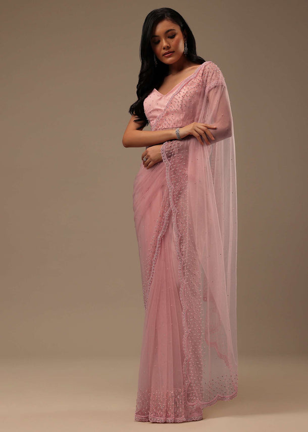 Peach Pink Stone And Beads Embellished Net Saree