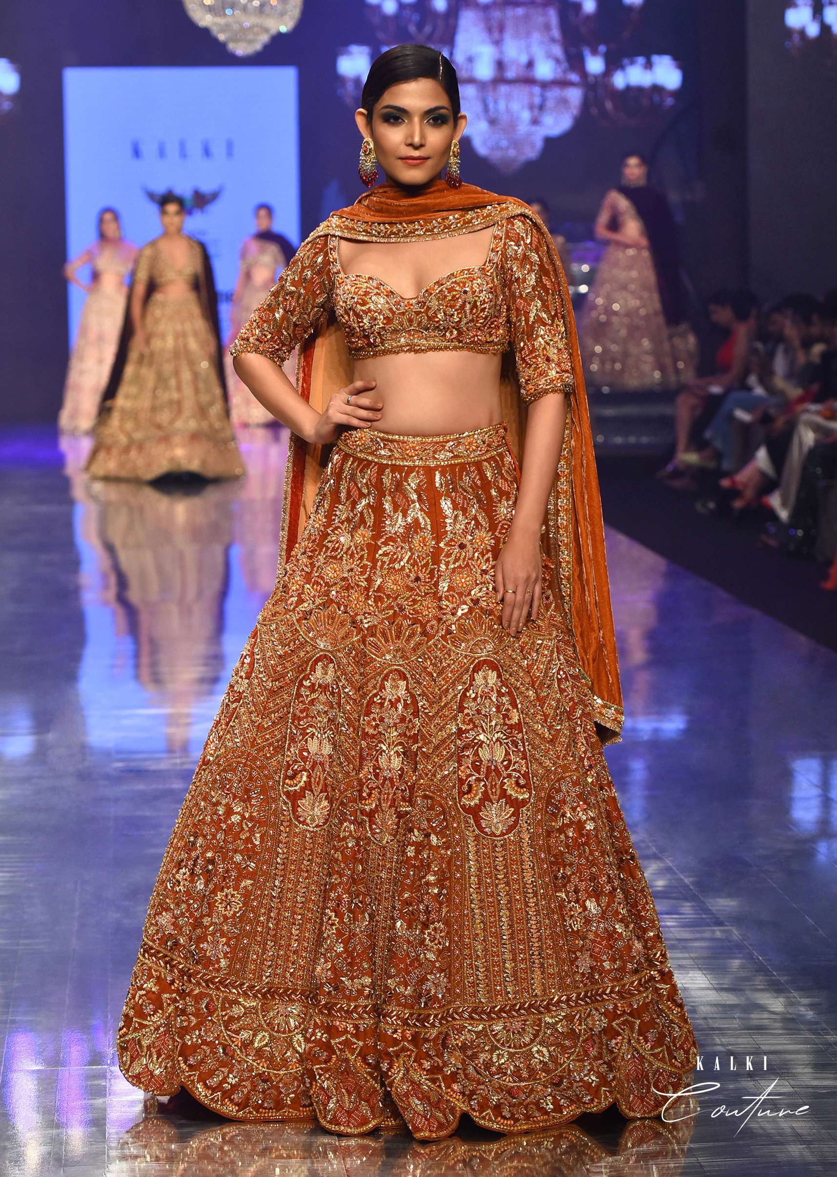 Burnt Orange Titian Bridal Lehenga In Raw Silk - NOOR 2022