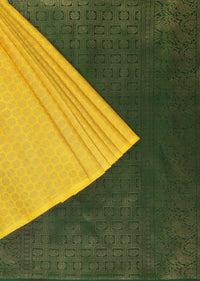 Canary Yellow Kanjivaram Silk Sari With Gold Weave And Unstitched Blouse