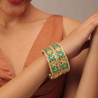 Gold Fineshed Kundan Polki Bangles In Ruby Red And WhiteTone