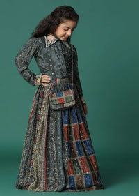 Kalki Multi Colored Top And Skirt Set In Satin Blend With A Matching Sling Bag