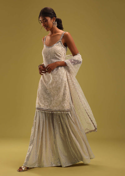 Ivory White Lucknowi Embroidered Net Kurti And Georgette Sharara Set