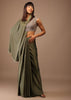 Moss Green Satin Saree With Fringes On Pallu Paired With Deep Neck Hand Embroidered Crop Top