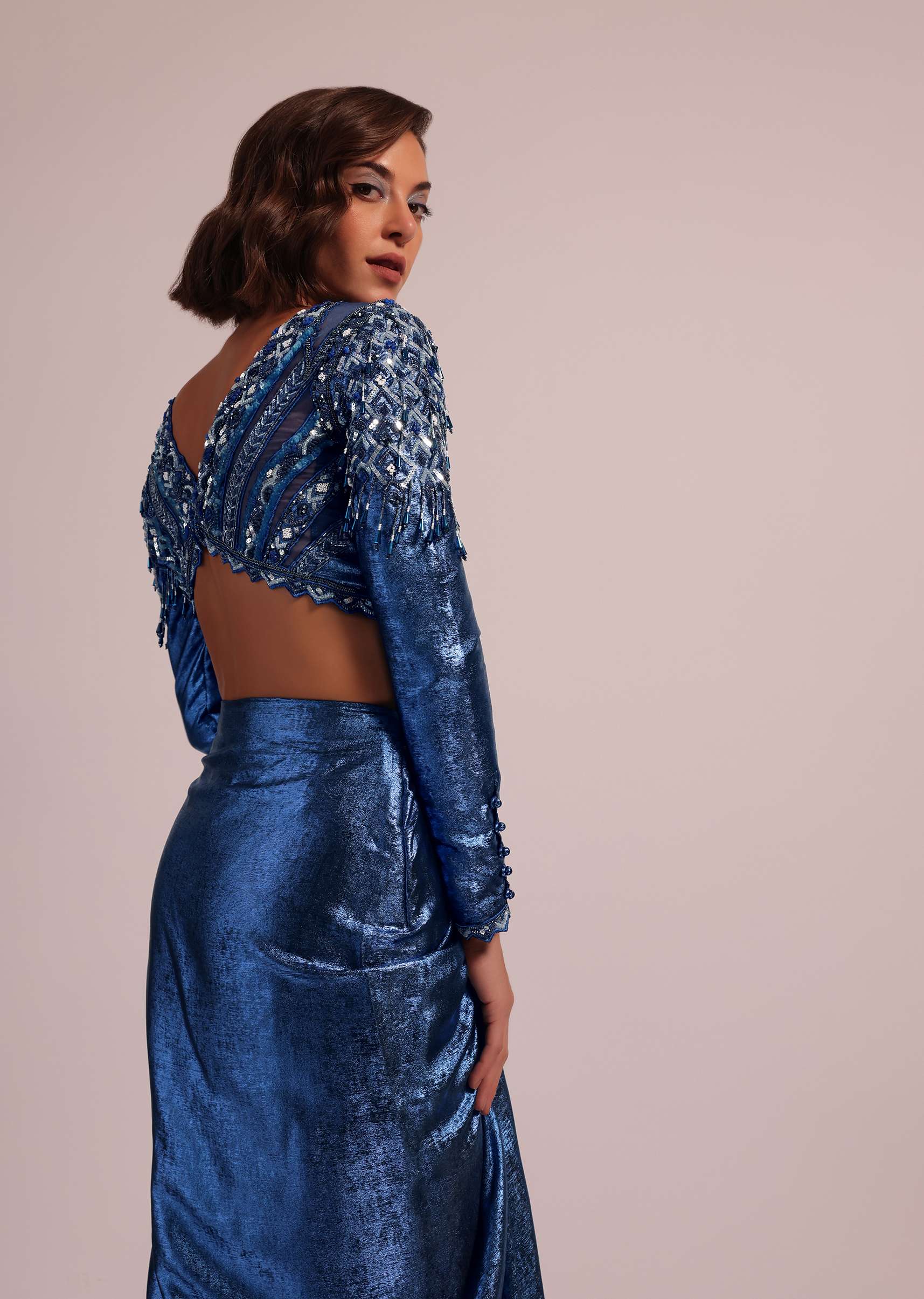 Metallic Blue Draped Skirt And Blouse With Heavy Embroidery