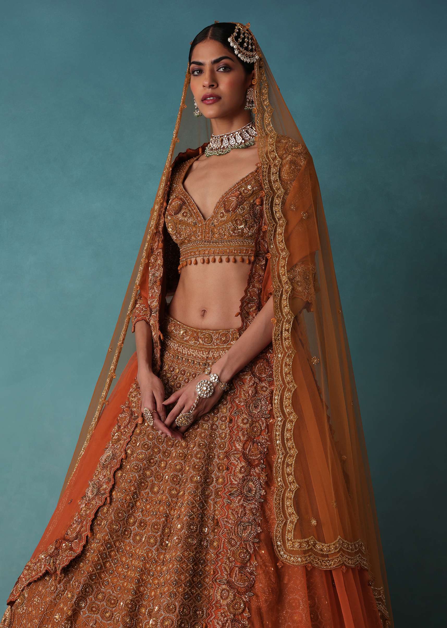 Brown Raw Silk Bridal Lehenga Set With Hand Embroidery