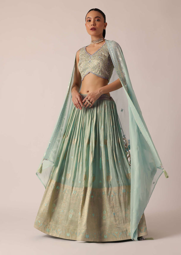 Green Lehenga Set In Brocade Silk With Floral Buttis