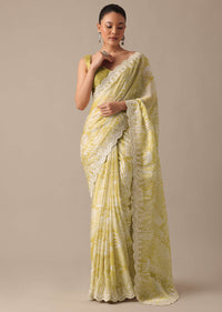 Yellow Printed Satin Saree With Embroidered Detail And Unstitched Blouse Piece