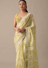 Yellow Printed Satin Saree With Embroidered Detail And Unstitched Blouse Piece