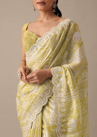 Yellow Printed Satin Saree With Embroidered Detail And Unstitched Blouse Piece