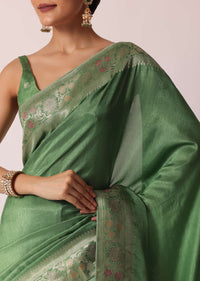 Green Banarasi Saree With Floral Motif Woven Pallu And Unstitched Blouse Piece