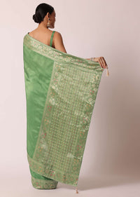 Green Banarasi Saree With Floral Motif Woven Pallu And Unstitched Blouse Piece