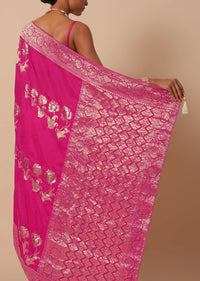 Rani Pink Banarasi Silk Saree With Floral Motif Pallu And Unstitched Blouse Piece