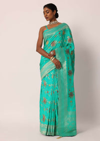 Teal Saree In Banarasi Silk With Floral Motifs And Unstitched Blouse Piece