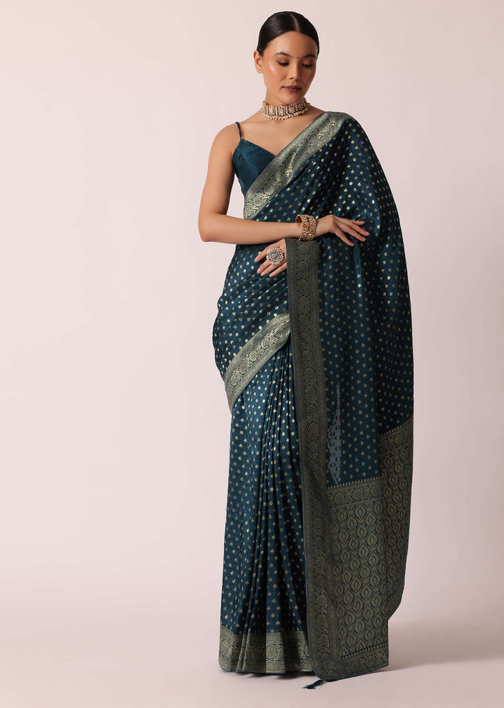 Teal Dola Silk Saree With Woven Zari Pallu And Unstitched Blouse Piece