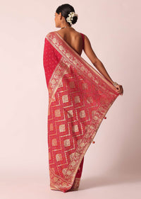 Red Bandhani Saree With Weave Detail And Unstitched Blouse Piece