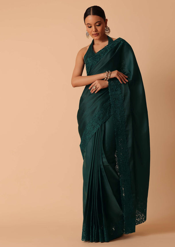 Green Saree In Organza With Lace Border And Unstitched Blouse Piece