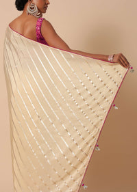 Beige Dola Silk Saree With Lurex Zari Stripes And Contrast Unstitched Blouse Piece