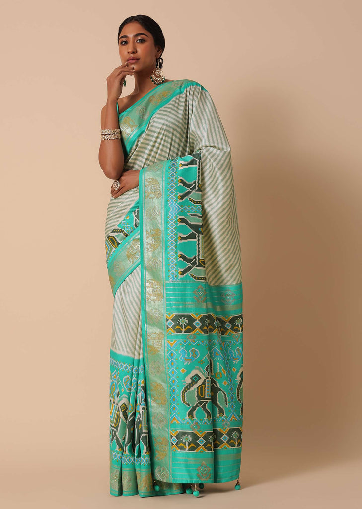 Sea Green Dola Silk Patola Printed Saree With Foil Detail Pallu And Unstitched Blouse Piece