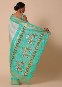 Sea Green Dola Silk Patola Printed Saree With Foil Detail Pallu And Unstitched Blouse Piece