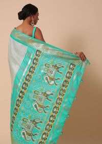 Sea Green Dola Silk Patola Printed Saree With Foil Detail Pallu And Unstitched Blouse Piece