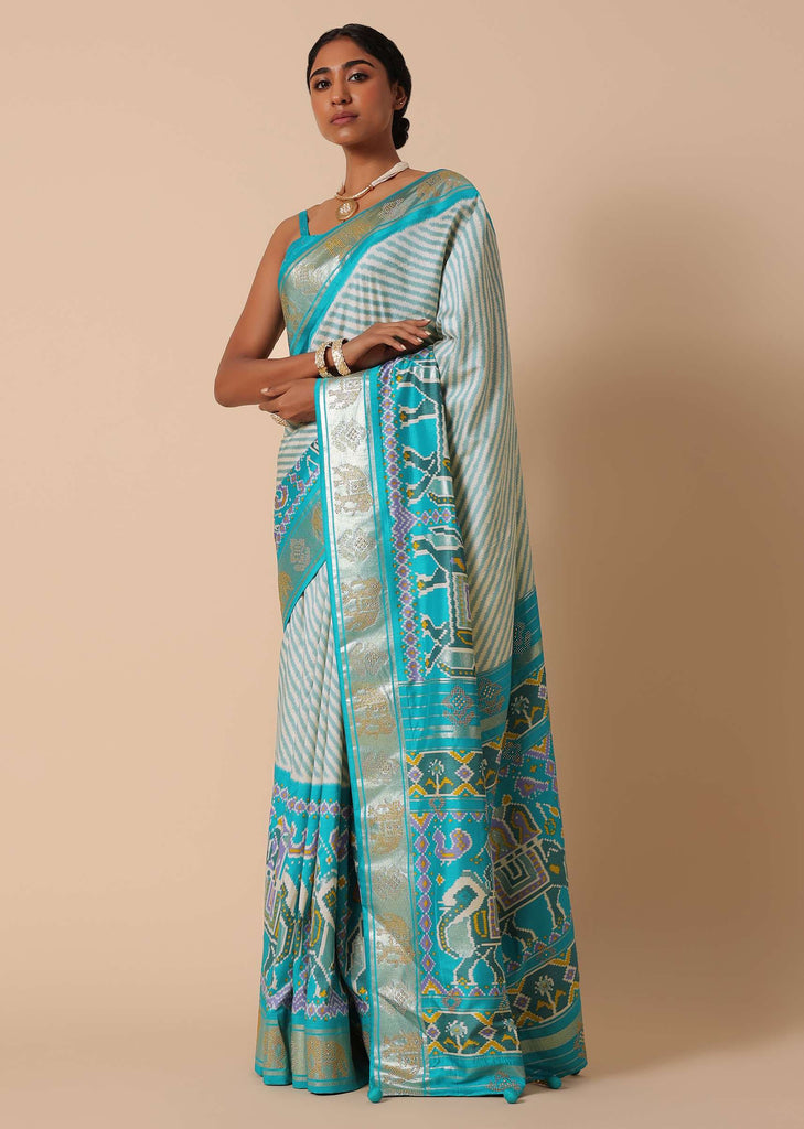 Sea Blue Patola Saree In Silk With Foil Worked Border And Unstitched Blouse Piece