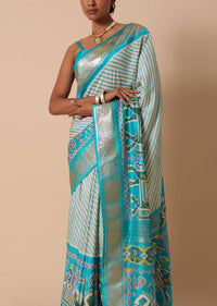 Sea Blue Patola Saree In Silk With Foil Worked Border And Unstitched Blouse Piece