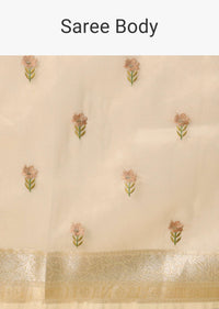 White Kora Silk Woven Saree With Floral Motif Work And Unstitched Blouse Piece