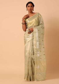 White Kora Silk Woven Saree With Floral Motif Work And Unstitched Blouse Piece