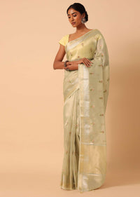 White Kora Silk Woven Saree With Floral Motif Work And Unstitched Blouse Piece